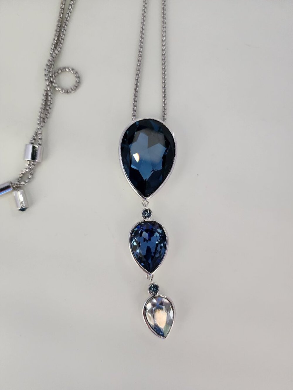 Touchstone Crystal Pear Drop Montana Blue Pendant Necklace
